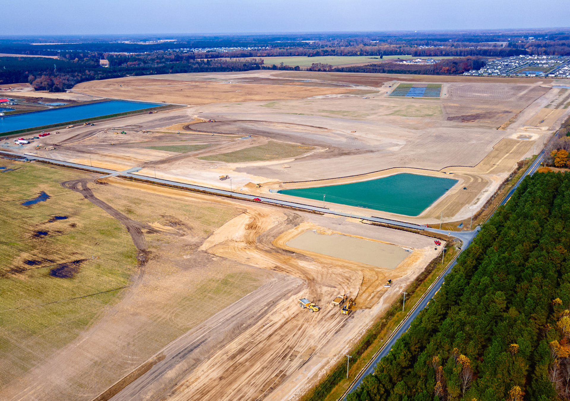 conservation-award-2024-hero-image Aerial view of a large-scale land development project.