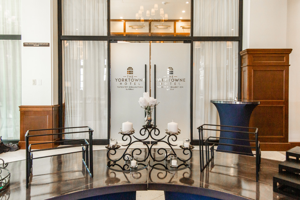 Frosted glass doors that say "The Yorktowne Hotel"