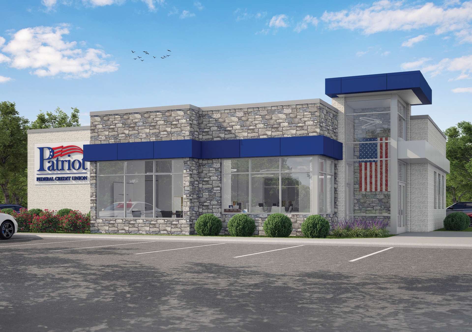 patriot-federal-credit-union-press-release A rendering of a new Patriot Federal Credit Union with blue accents, large grey bricks, and an American flag hanging on the inside.